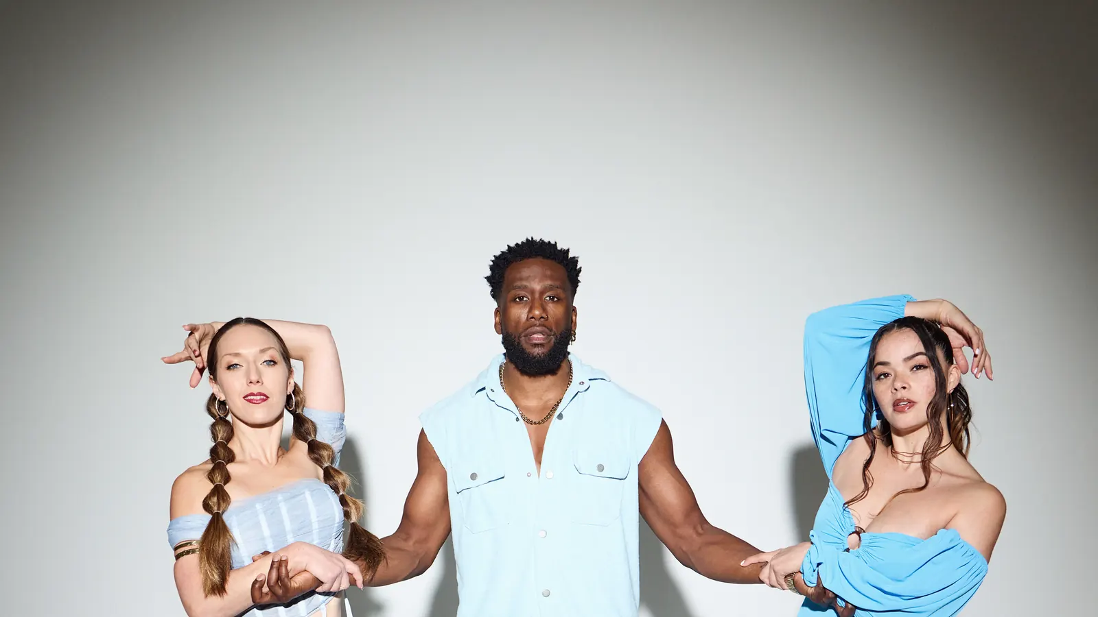 Chamalo, T-zer and Jalyssa posing together in the studio