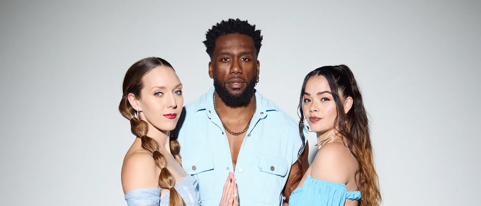 Chamalo, Jalyssa and T-zer together in the studio, hands pressed together
